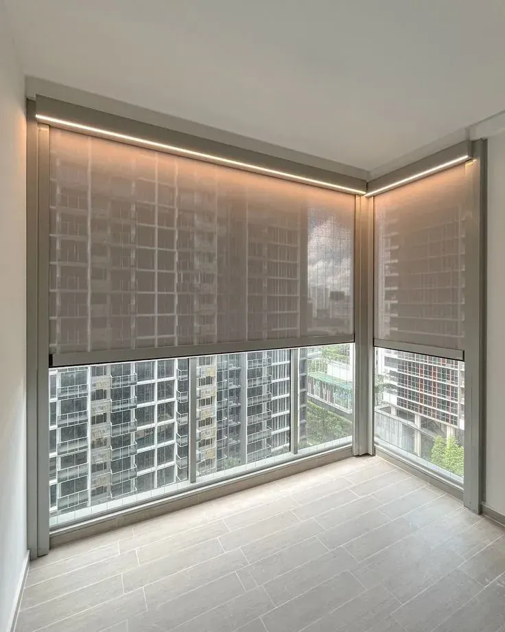 Motorized roller shades on tall Cumberland windows